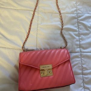 Michael Kors salmon color purse. Barely used new condition